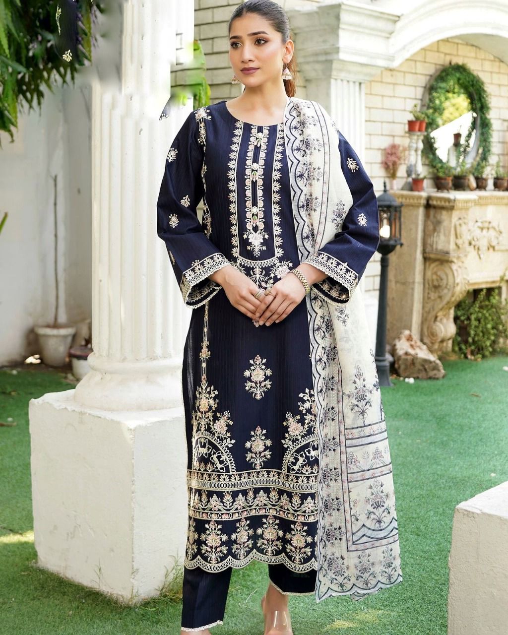 Elegant Embroidered Navy Blue Suit with Soft Manaar Printed dupatta & Loose It Trouser